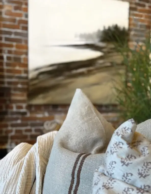 Linen pillows folded on a table