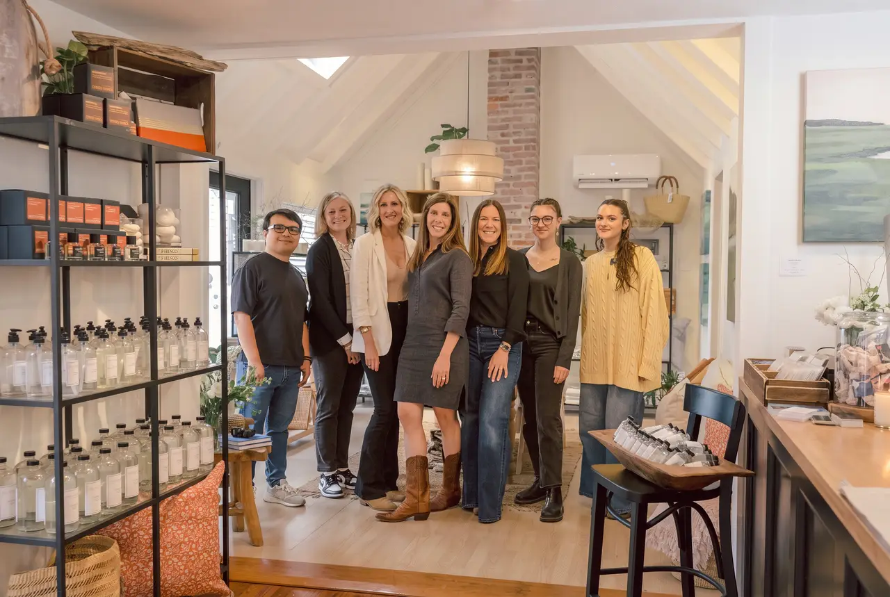 Friends and team gathered in the Rehoboth shop at the opening